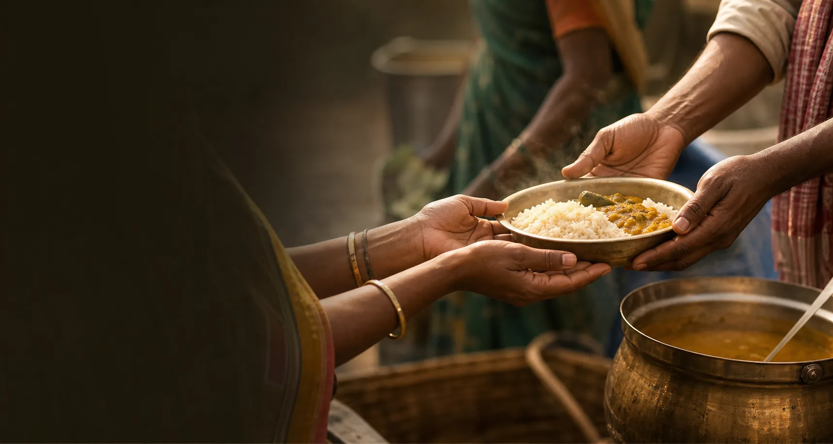 Hands offering food during a donation program
